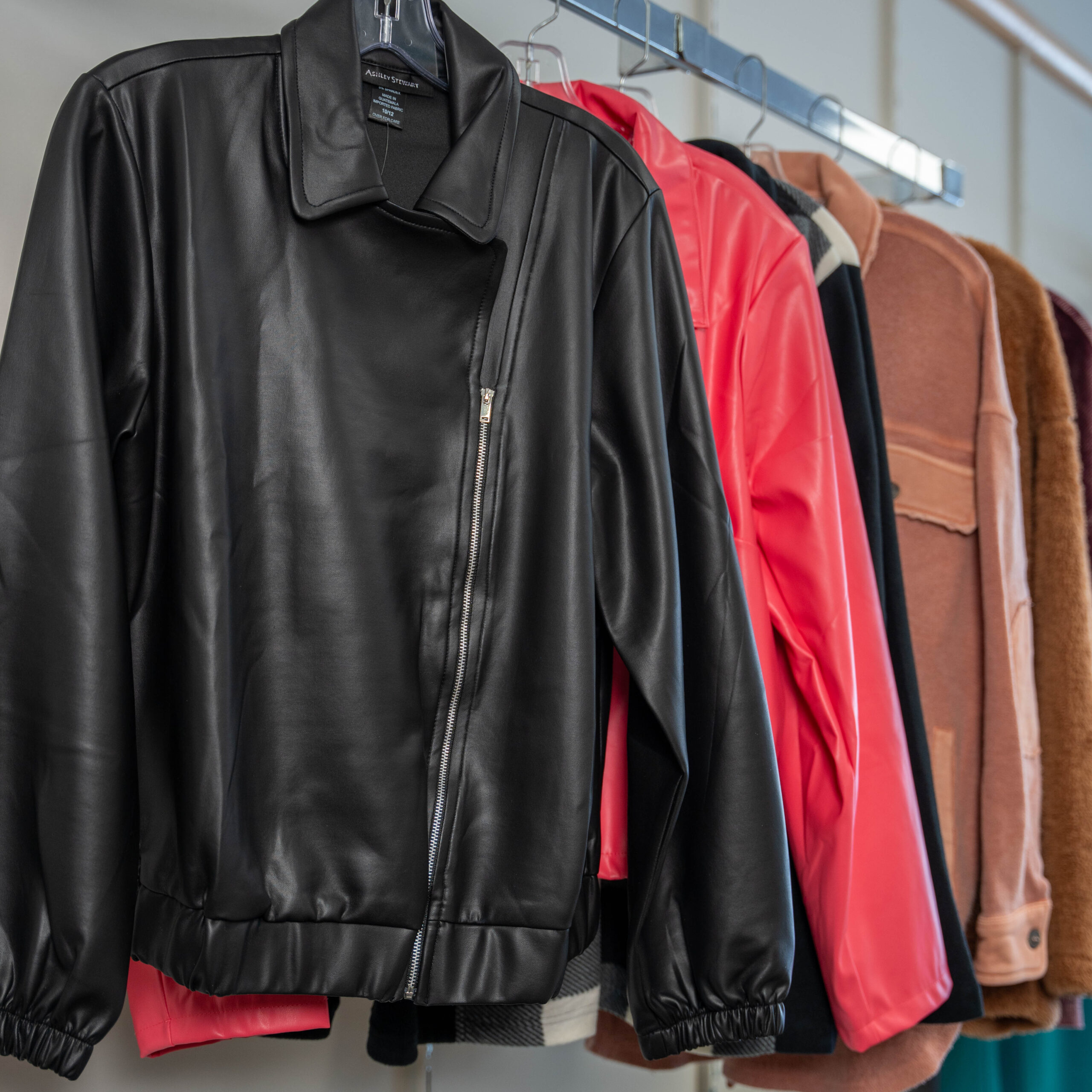 Leather jackets hanging on a rack