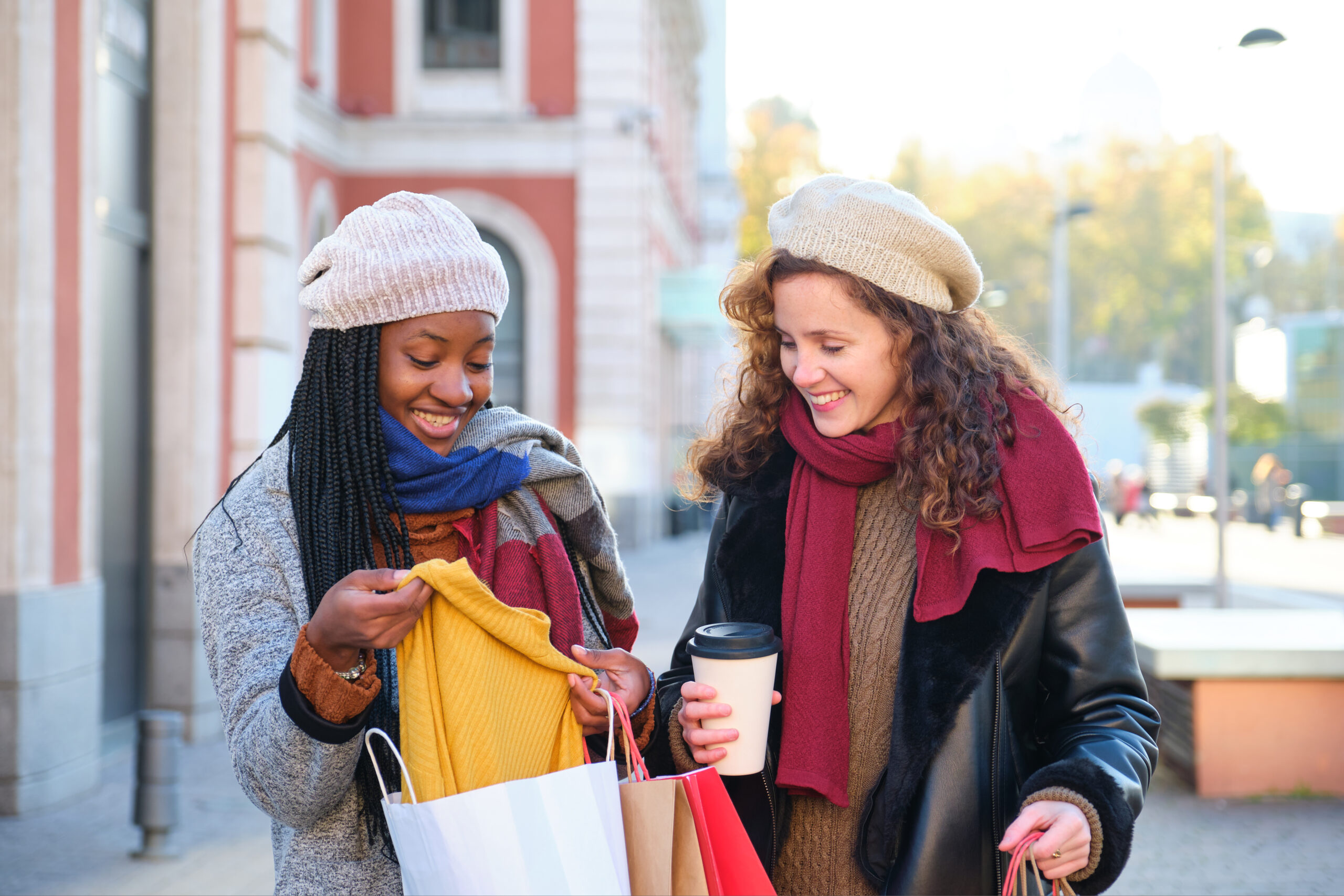 women looking at what they bought shopping
